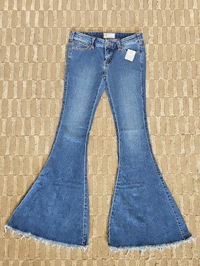 Free People Medium Blue Frayed Hem Wide Flare Jeans
